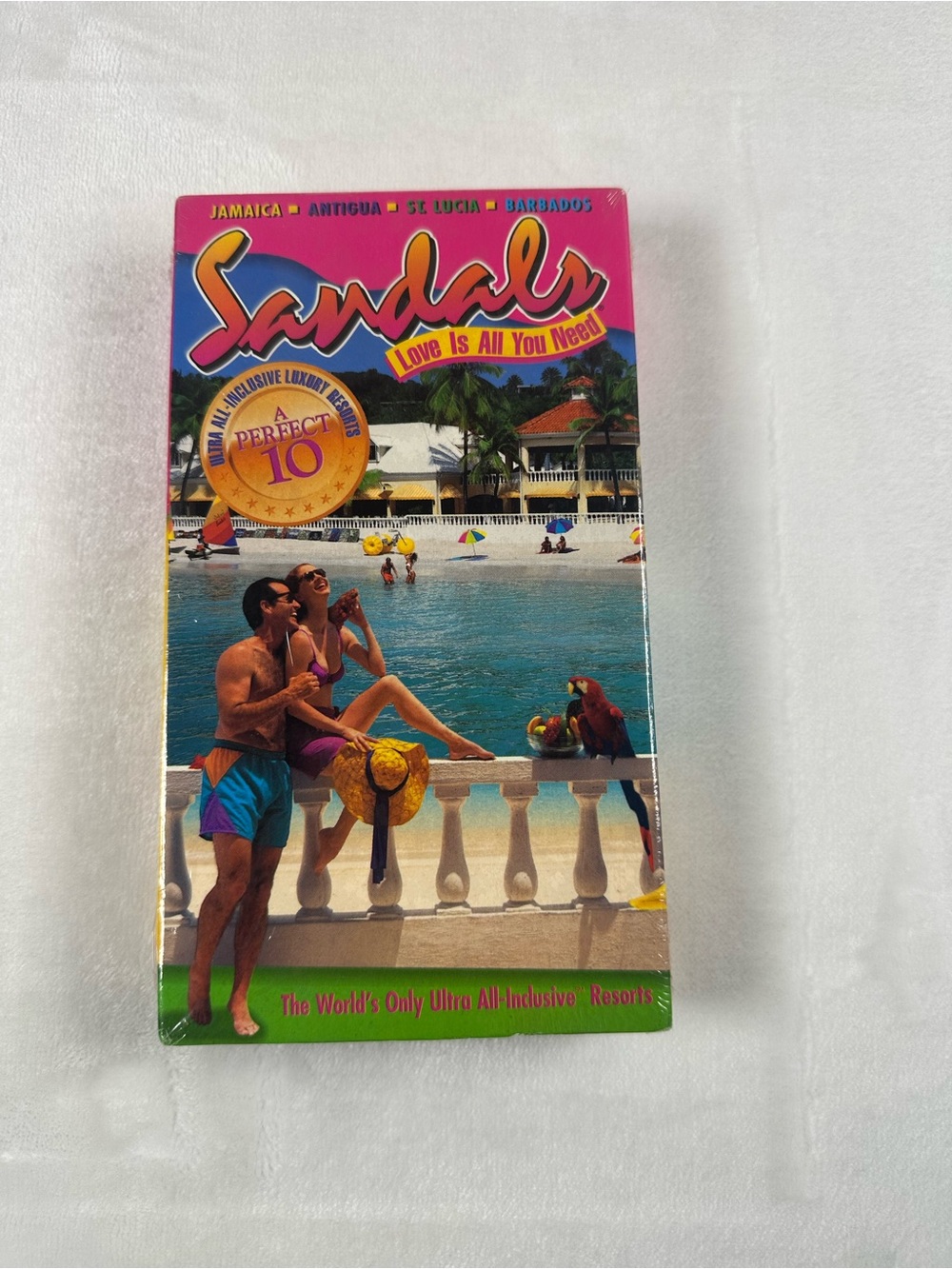 Sandals Resorts Vintage Travel Brochure VHS - Pink & Blue Cover